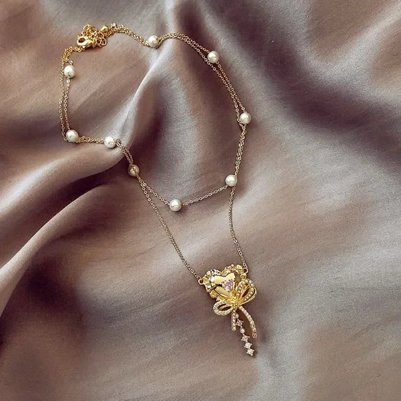 GOLICC Pearl Bow Necklace - Picture 3 of 8